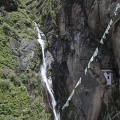 Waterfall and Pray Flags and Tiger’s Nest Monastery 